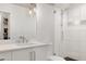 Bright and updated bathroom features modern fixtures and a glass-enclosed shower for a spa-like experience at 512 Page St, Cary, NC 27511