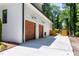 Exterior view of the home showing the garage, driveway, and fenced backyard at 512 Page St, Cary, NC 27511