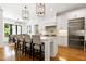 Bright, open kitchen features a large island with seating and modern appliances at 512 Page St, Cary, NC 27511
