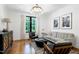 Cozy living room with modern decor and large window at 512 Page St, Cary, NC 27511