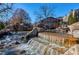 Scenic community water feature cascading over natural rock formations and into a stream at 512 Page St, Cary, NC 27511