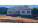 Charming single-story home with a symmetrical facade, gabled roof, and neat landscaping at 519 Mulberry Rd, Spring Hope, NC 27882