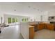 Bright basement featuring light-colored walls, hardwood cabinets, and access to the yard at 5237 Christian Light Rd, Fuquay Varina, NC 27526