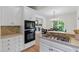 Well-equipped kitchen with stainless steel appliances and stylish cabinetry at 5237 Christian Light Rd, Fuquay Varina, NC 27526