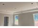 Bedroom featuring windows and crown molding at 529 Mulberry Rd, Spring Hope, NC 27882