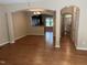 Open-concept living space with hardwood floors and views into the kitchen at 532 Matheson Pl, Cary, NC 27511