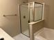 Bathroom showcasing a glass shower enclosure with tiled walls at 532 Matheson Pl, Cary, NC 27511