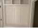 Built-in mudroom unit with bench, hooks, and storage for organization at 539 Mulberry Rd, Spring Hope, NC 27882