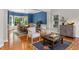 Bright living room with hardwood floors, ample seating, and natural light at 6 Beltre Ct, Durham, NC 27705