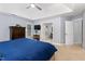 Comfortable main bedroom with ensuite bathroom access, a large bed, and plenty of natural light creating a peaceful retreat at 6 Beltre Ct, Durham, NC 27705