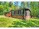 Exterior of house featuring manicured lawn and well-maintained landscaping at 6082 Zachary Lane Ln # 1S, Oxford, NC 27565