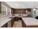 Modern kitchen with stainless steel appliances and a stylish island at 6082 Zachary Lane Ln # 1S, Oxford, NC 27565