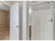 Bright bathroom boasts a glass-enclosed shower with white tiling at 752 Wickham Ridge Rd, Apex, NC 27539