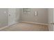 Neutral bedroom features beige carpet and a window at 752 Wickham Ridge Rd, Apex, NC 27539