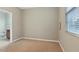 Bedroom with neutral walls, carpet floors and adjacent bathroom at 752 Wickham Ridge Rd, Apex, NC 27539