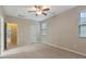 Neutral bedroom with carpet, ceiling fan, and natural light at 752 Wickham Ridge Rd, Apex, NC 27539