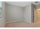 Neutral bedroom features beige carpet and a window at 752 Wickham Ridge Rd, Apex, NC 27539
