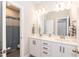 Bright bathroom featuring double vanity, modern fixtures, and a shower/tub combo at 76 Freewill Pl, Raleigh, NC 27603