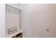 Mudroom-style entryway features a bench, storage, and coat hooks for added convenience at 76 Freewill Pl, Raleigh, NC 27603