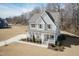 Stylish two-story home with a well-manicured lawn and a classic, inviting design at 76 Freewill Pl, Raleigh, NC 27603
