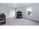 Home office with large windows, neutral walls, and carpeted flooring, perfect for a productive workspace at 76 Freewill Pl, Raleigh, NC 27603