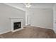 Living room featuring a fireplace, wood flooring, neutral paint, recessed lighting, and a ceiling fan at 765 S Hollybrook Rd, Wendell, NC 27591
