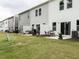 View of multiple home backyards showcasing individual patios and lawn areas with privacy fences at 80 Willow Green Dr, Clayton, NC 27527