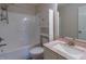 Full bathroom includes a tub shower, sink with granite counter, and updated fixtures at 805 Penncross Dr, Raleigh, NC 27610