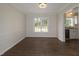 Dining room featuring a modern chandelier and a window with a view to the outdoors at 805 Penncross Dr, Raleigh, NC 27610