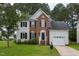 Beautiful two-story brick and siding home with attached garage at 805 Penncross Dr, Raleigh, NC 27610