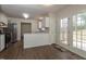 Modern kitchen featuring stainless steel appliances, white cabinets, and light countertops at 805 Penncross Dr, Raleigh, NC 27610