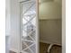 Storage area showcasing mirrored sliding doors and built-in shelving at 805 Penncross Dr, Raleigh, NC 27610