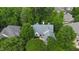 Overhead view of the house with mature trees and landscaping surrounding the property and neighborhood at 81502 Alexander, Chapel Hill, NC 27517