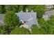 A home with welcoming curb appeal and beautiful, mature trees at 81502 Alexander, Chapel Hill, NC 27517