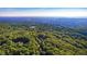 An aerial view of the community, showing golf course and surrounding trees at 81502 Alexander, Chapel Hill, NC 27517