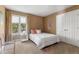 Cozy bedroom with a plush bed, natural light from the window, and ample closet space at 81502 Alexander, Chapel Hill, NC 27517