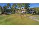 The beautiful clubhouse is nestled along the green on the golf course at 81502 Alexander, Chapel Hill, NC 27517