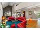 Open-concept living area boasts hardwood floors, fireplace, modern furniture and bright, airy feel at 81502 Alexander, Chapel Hill, NC 27517