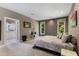 Comfortable main bedroom with neutral color palette, plush carpet, and bathroom access at 81502 Alexander, Chapel Hill, NC 27517