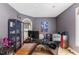 Office featuring a hardwood floor, modern desk, and an arched doorway at 81502 Alexander, Chapel Hill, NC 27517