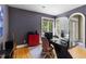 Stylish home office with hardwood floors, modern desk, and natural light at 81502 Alexander, Chapel Hill, NC 27517