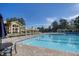 Luxurious swimming pool with ample lounge chairs, cabanas, and manicured landscaping, perfect for relaxation and recreation at 81502 Alexander, Chapel Hill, NC 27517