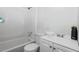 Bathroom featuring tile floors, white vanity, toilet, and shower at 995 Shawtown Rd, Lillington, NC 27546