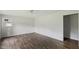 Bedroom with new hardwood floors, a ceiling fan, and neutral walls, offering a clean and calming atmosphere at 995 Shawtown Rd, Lillington, NC 27546