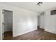 Bedroom featuring hardwood-style flooring and an en-suite bathroom at 995 Shawtown Rd, Lillington, NC 27546