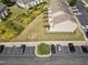 Aerial shot showcasing townhomes, visitor parking, and landscaped grounds in the community at 100 Stratford Lakes Dr # 361, Durham, NC 27713