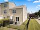 View of back of home featuring a patio, well-maintained lawn, and privacy fence at 100 Stratford Lakes Dr # 361, Durham, NC 27713