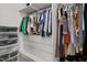 Spacious walk-in closet providing ample storage solutions with built-in shelving and drawers at 100 Stratford Lakes Dr # 361, Durham, NC 27713