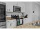 Well-equipped kitchen featuring granite countertops, stainless steel appliances, and ample cabinet space at 100 Stratford Lakes Dr # 361, Durham, NC 27713