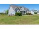 A charming single-Gathering home with a well-maintained lawn and gray siding at 104 Jj Dr, Benson, NC 27504